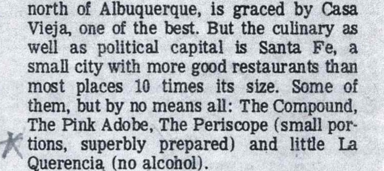 A scrap of newsprint listing the good restaurants of Santa Fe and ending with little La Querencia. A star is drawn in ink in the margin.